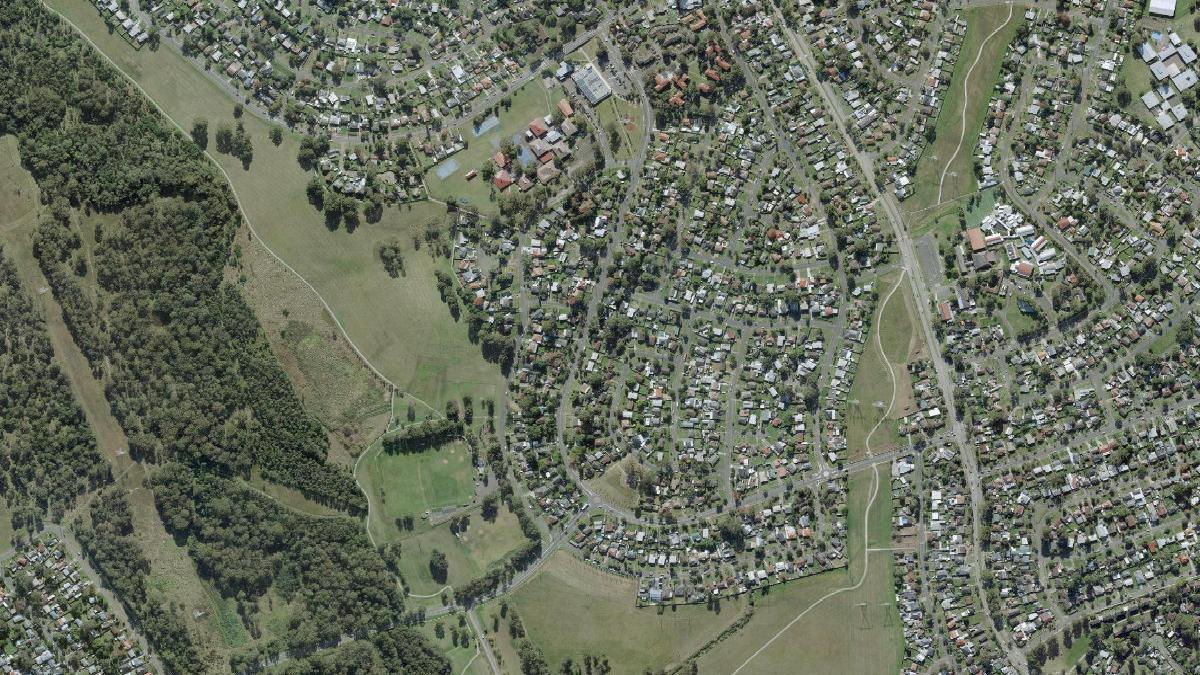 Aerial photograph centred on Tregear showing residential streets, Tregear Reserve and the Ropes Creek corridor